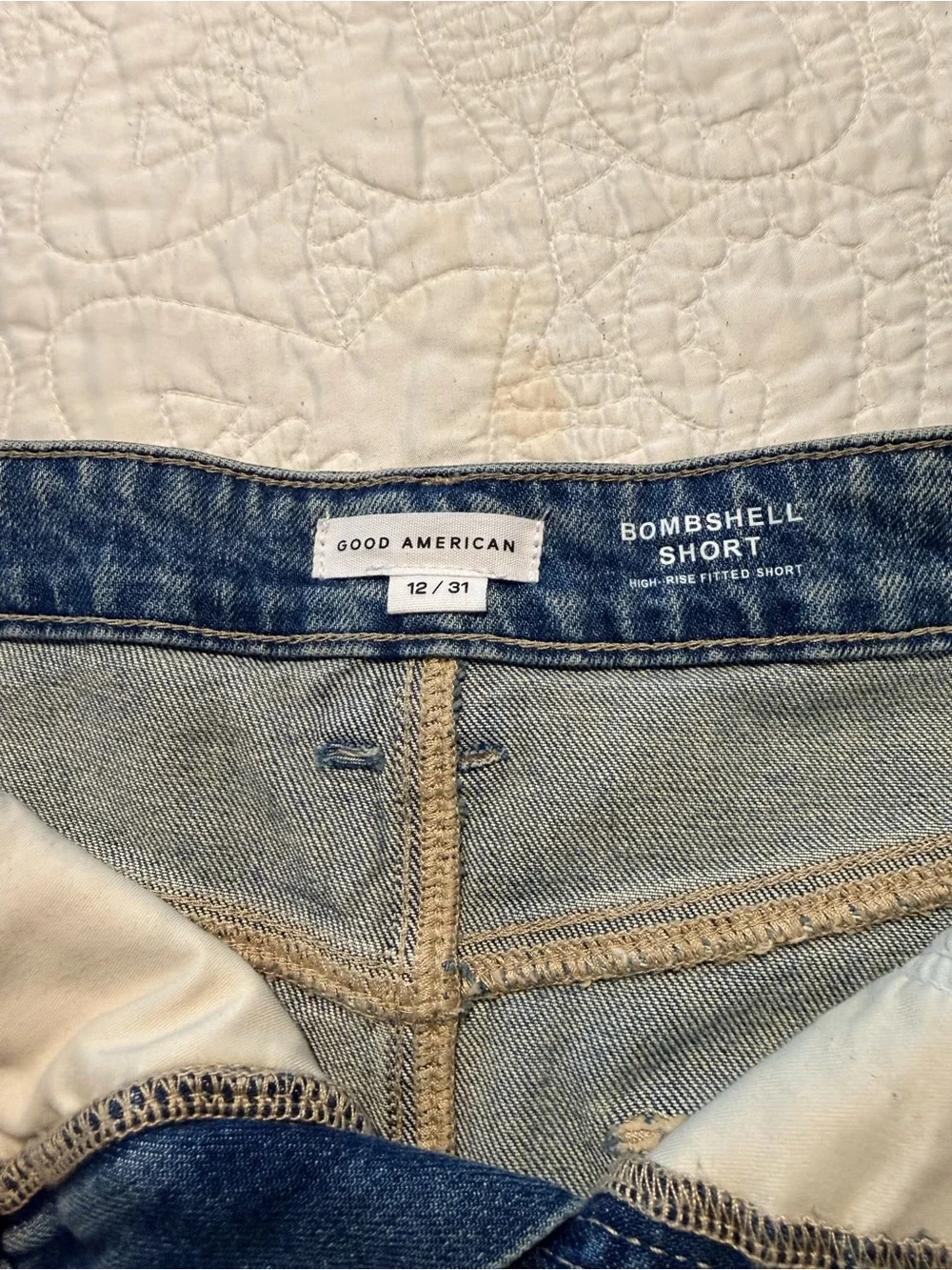Good American Faded Blue Distressed Denim Shorts